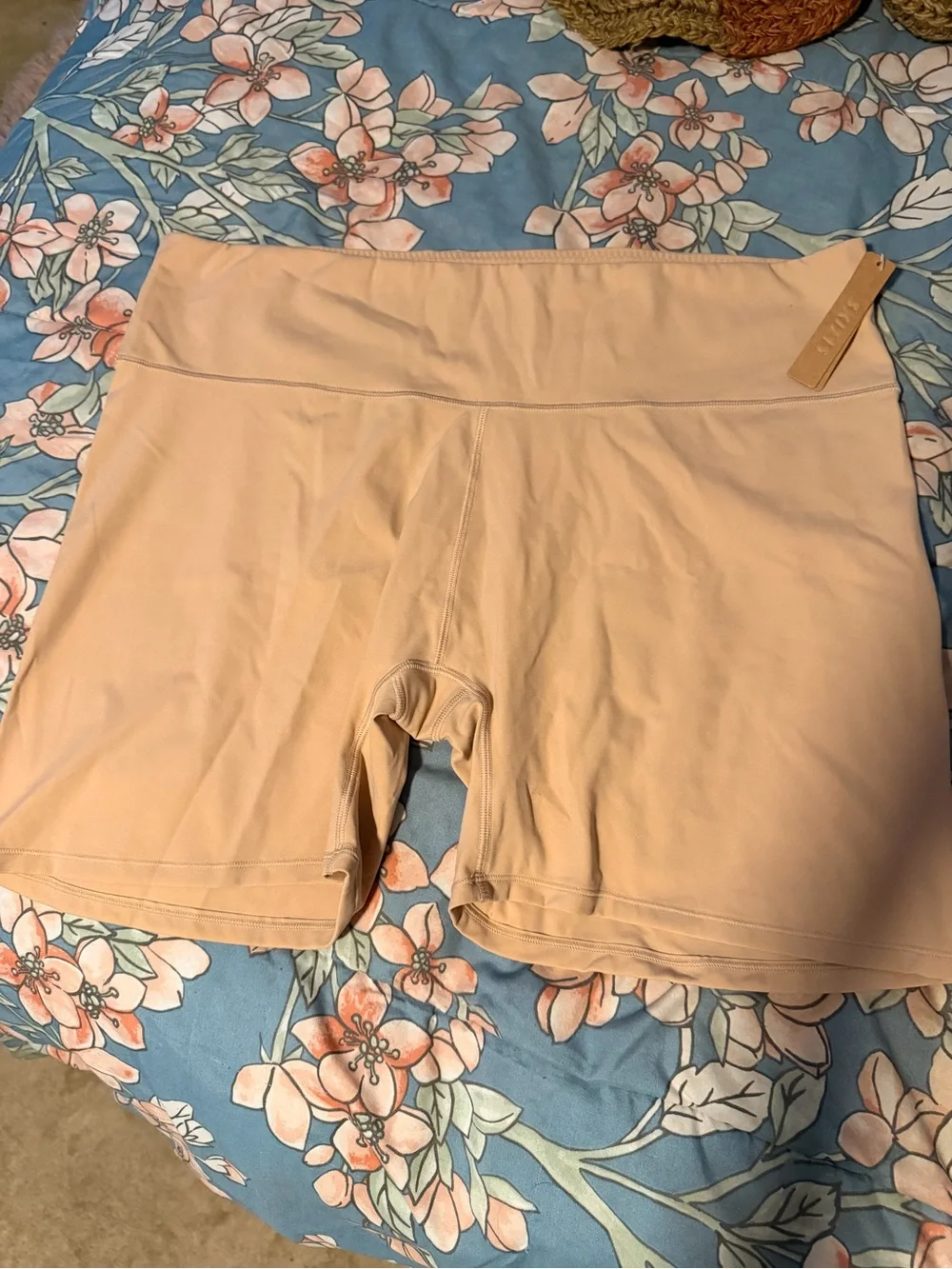 SKIMS High-Rise Biker Shorts in Light Nude